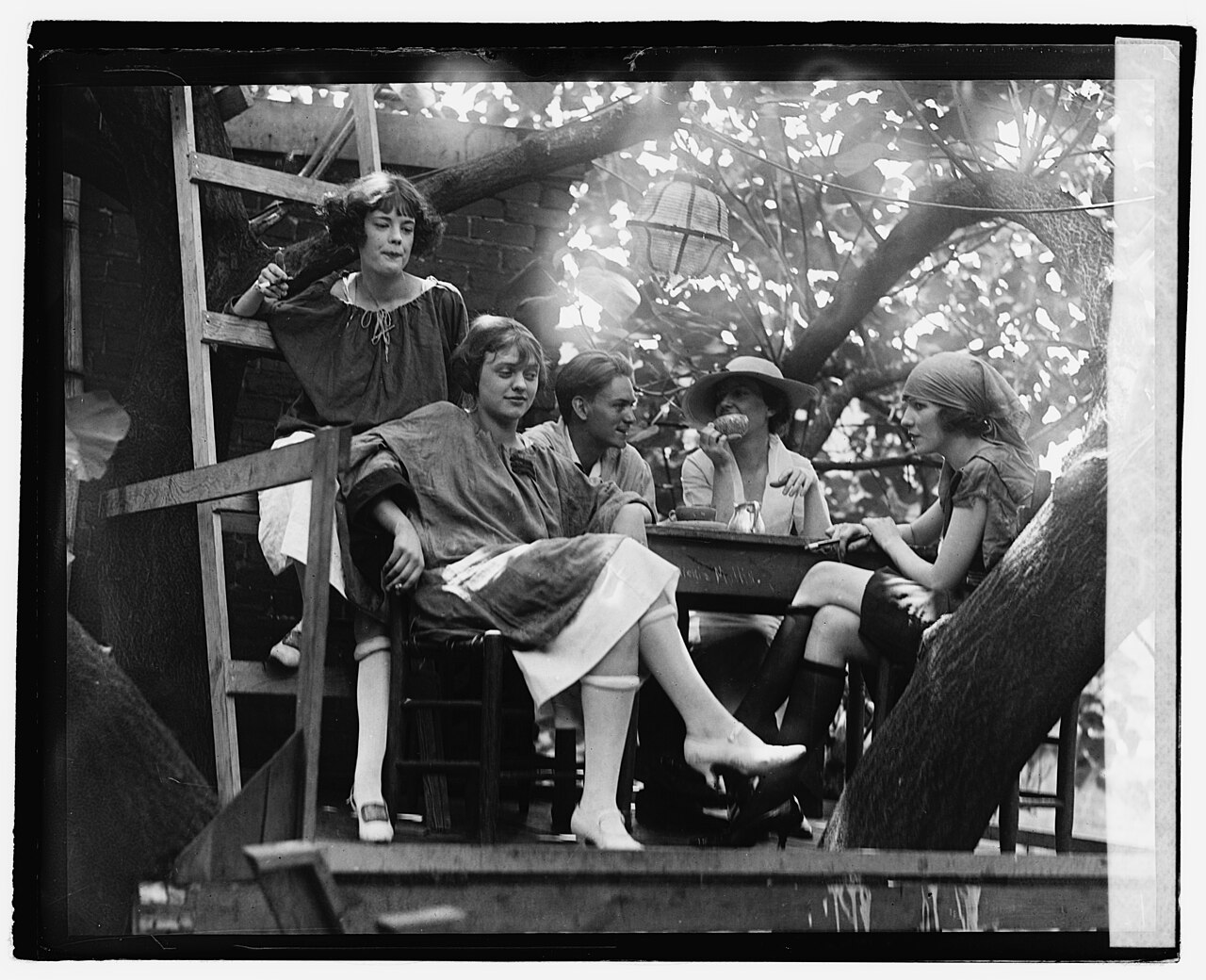 Guests gathered in the treehouse of the Krazy Kat Klub in Washington, D.C., in 1921